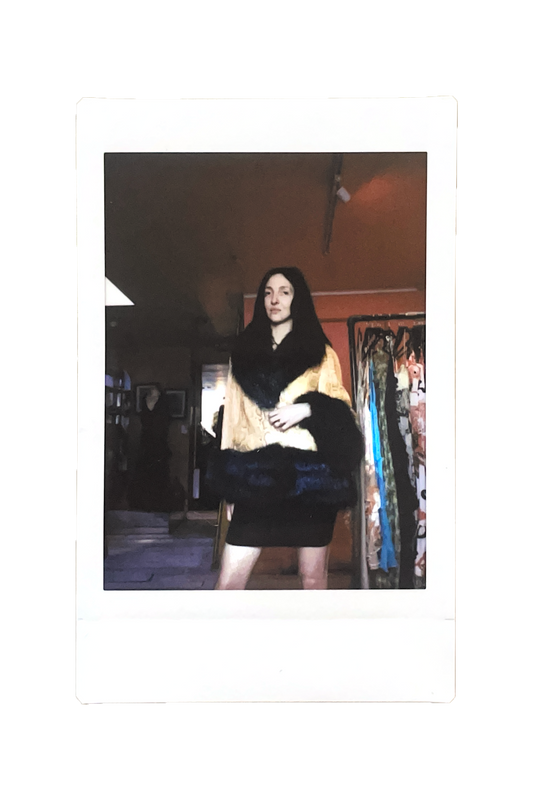 tish in A/W 2010 yellow python and arctic fox jacket